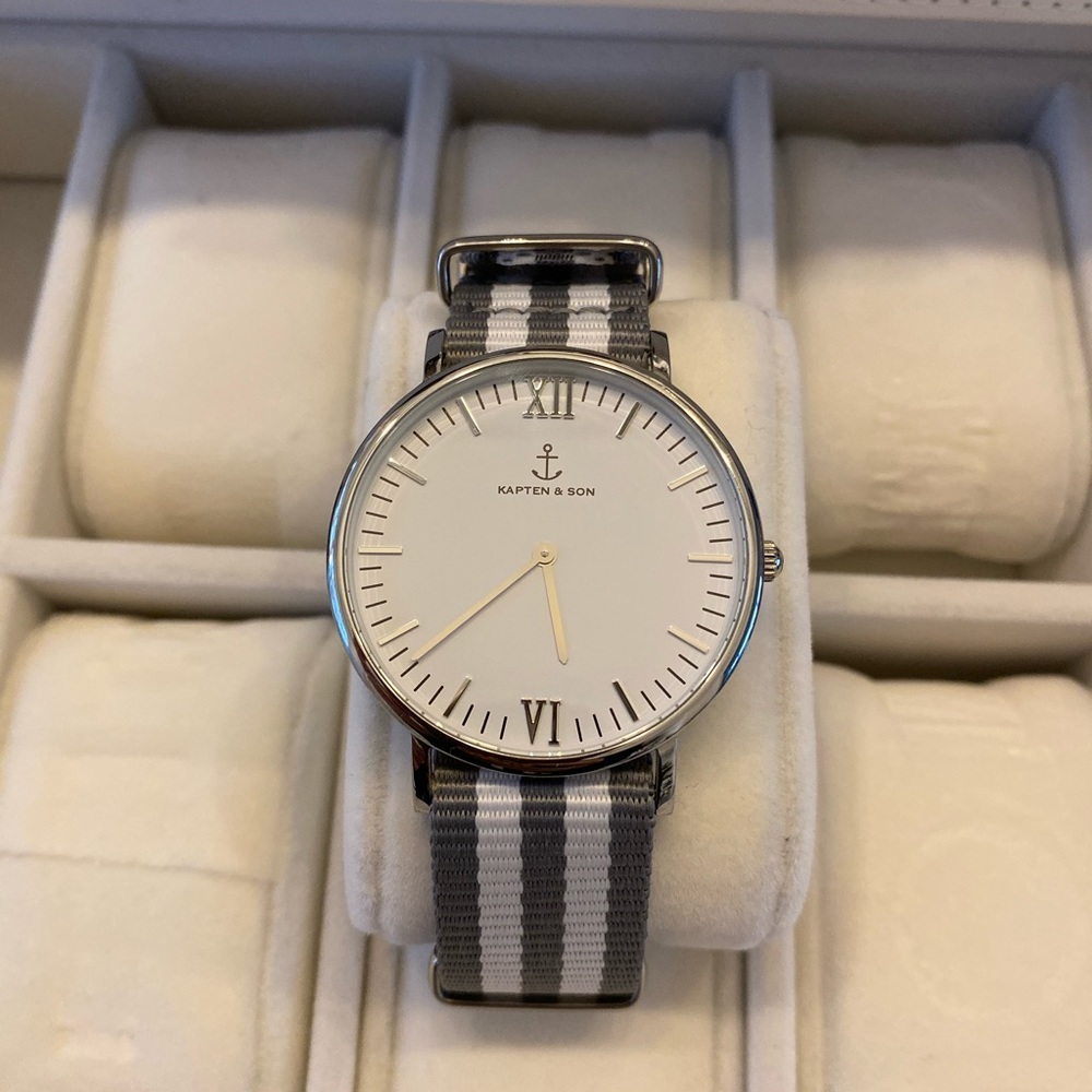 Grey and white striped Kapten and Son Watch.